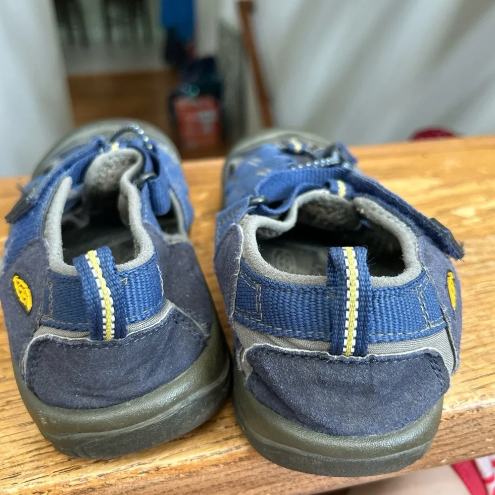 KEEN Kids' Newport H2 Sandals in a blue colorway hiking beach camp outdoors